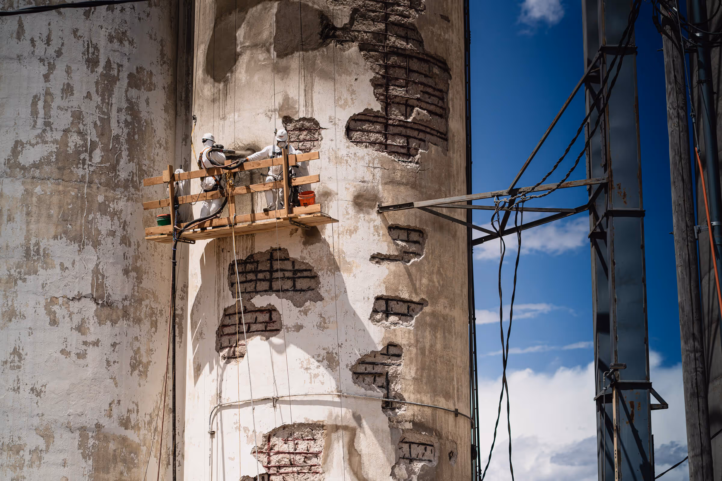 Men working on a silo