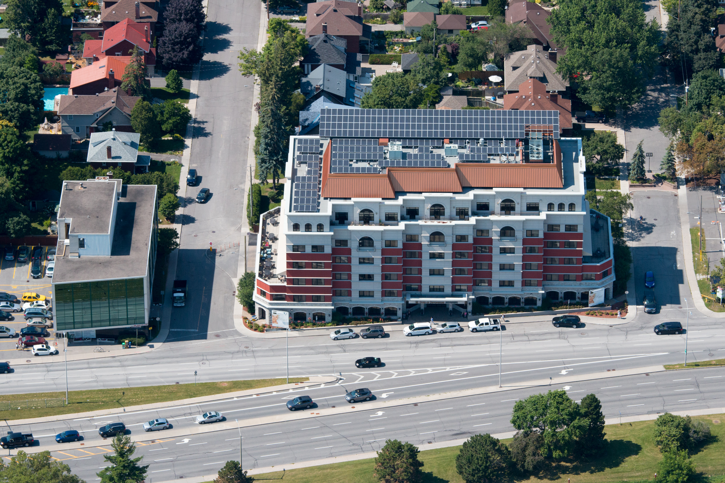 a different image of a technician installing solar panels for a green tech/cleantech company