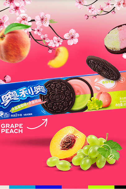 Package of Oreo cookies with grape and peach flavors surrounded by grape clusters, peach slices, and cherry blossoms on a pink gradient background.
