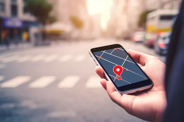 Person holding phone with map ap open