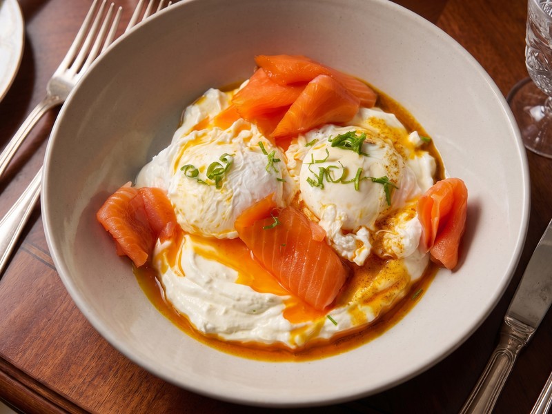 Poached eggs and cold smoked salmon with paprika brown butter