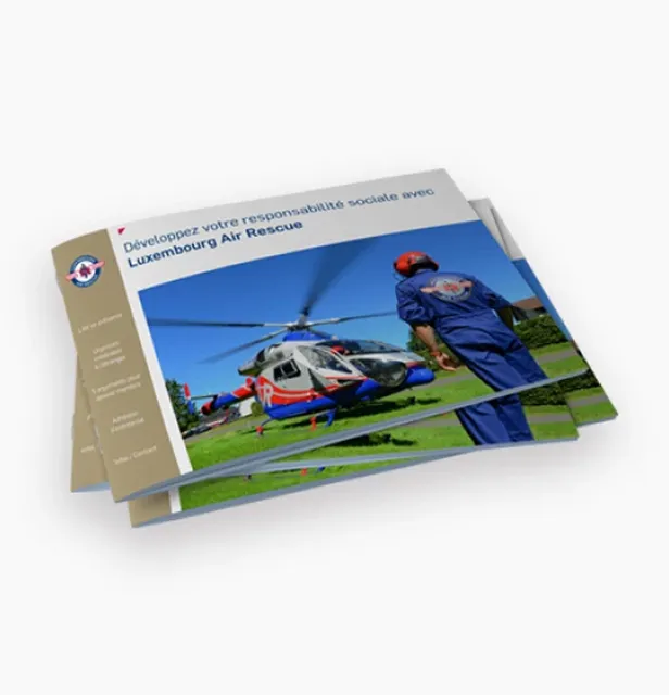 Umschlag der Broschüre, die einen Hubschrauber auf Gras mit einer Person in blauer Uniform und rotem Helm zeigt, die in der Nähe unter blauem Himmel läuft.