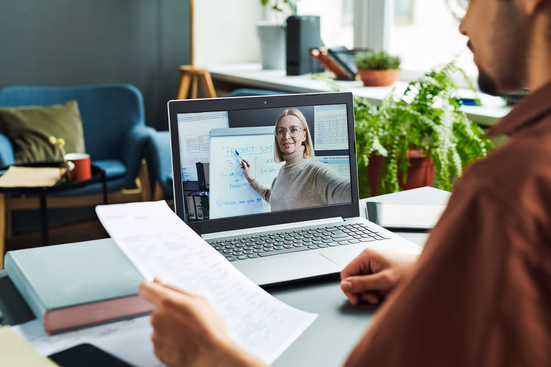 Woman listening to an online seminar — representing insurance solutions for home workers