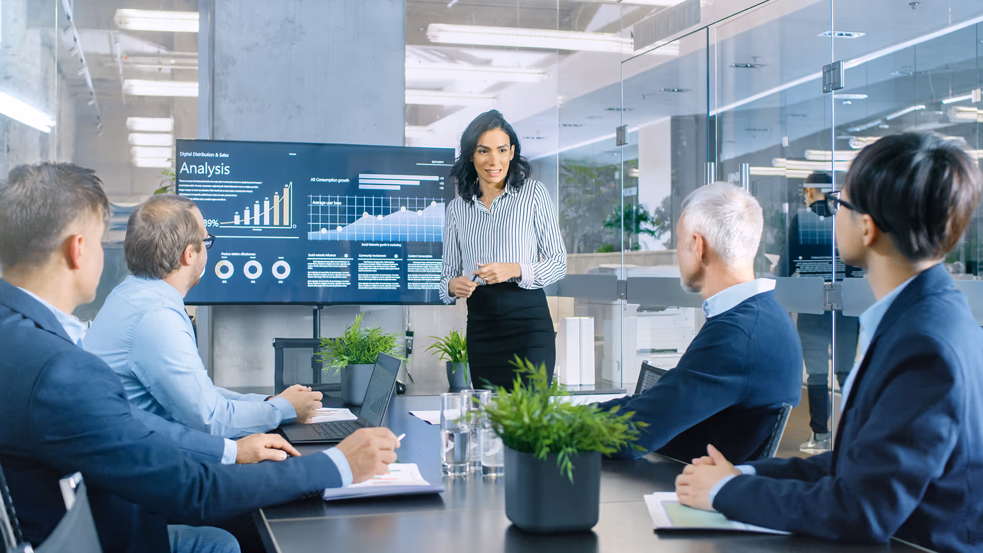 A woman presenting financial analysis in a meeting — representing pipeline funds insurance