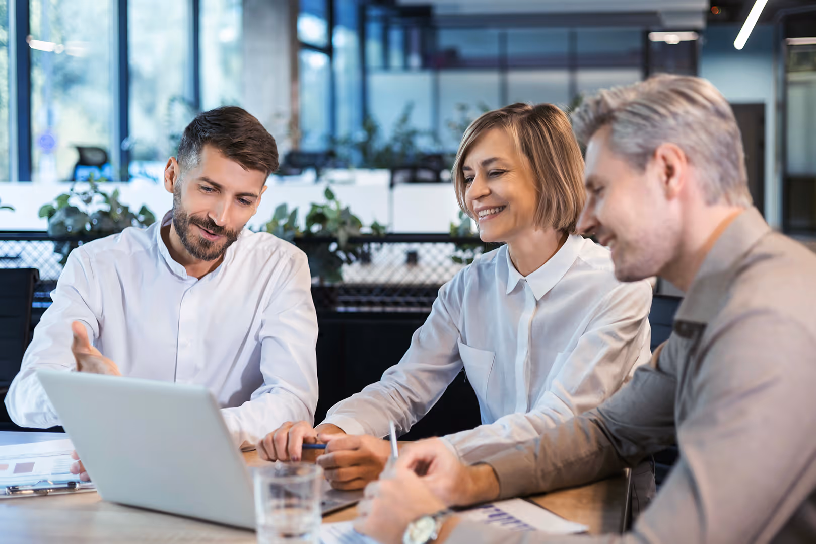 Specialist advisor discussing tour operator insurance with client