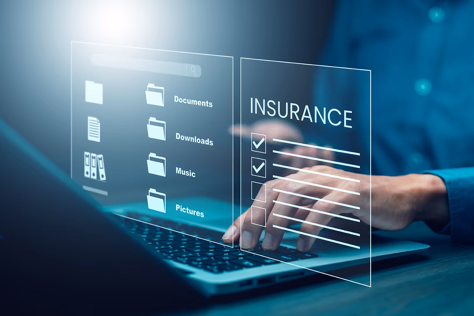 Man using laptop to buy travel business insurance