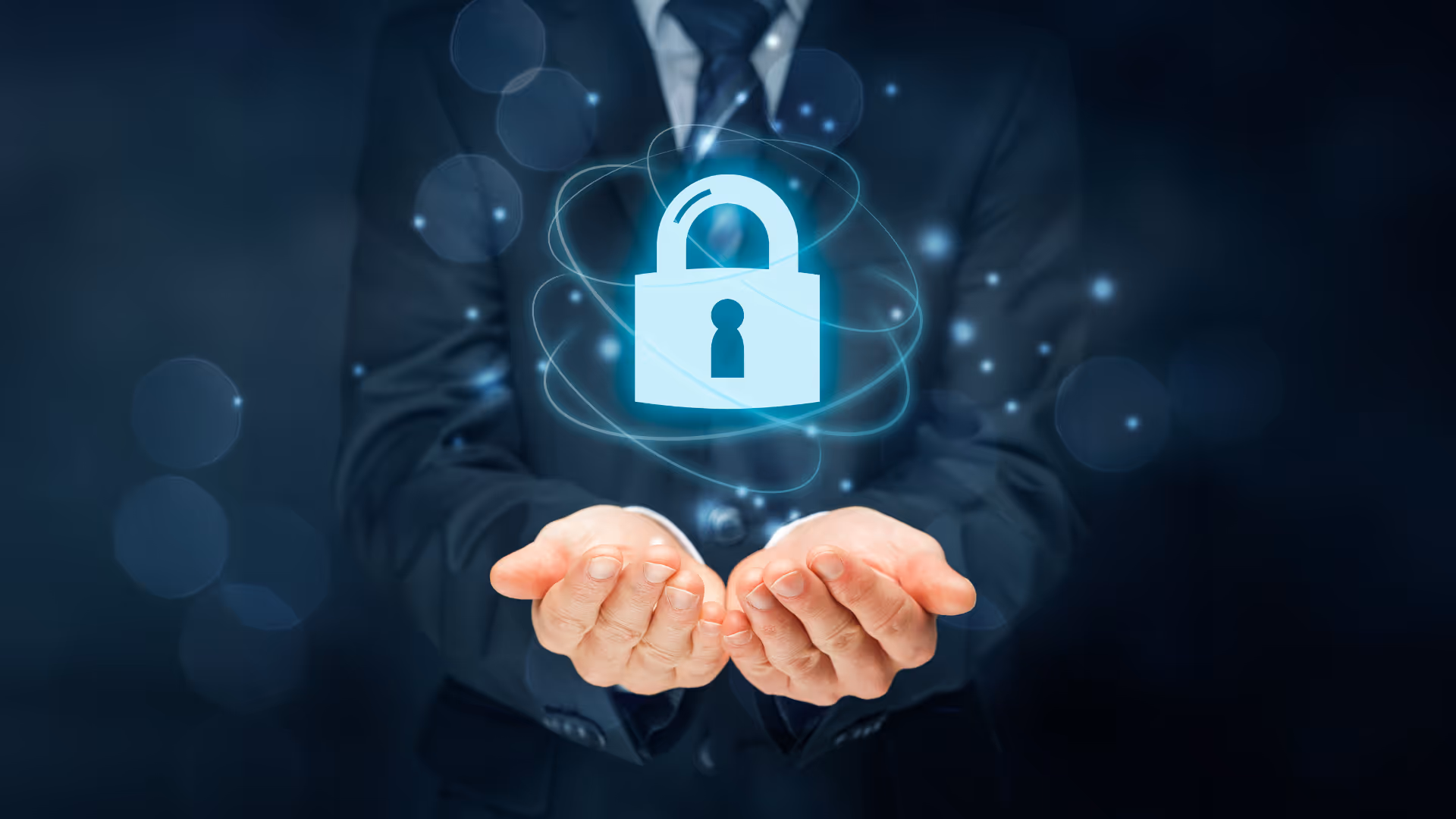 Holographic padlock hovering over a pair of hands, representing acquirer chargeback insurance protection