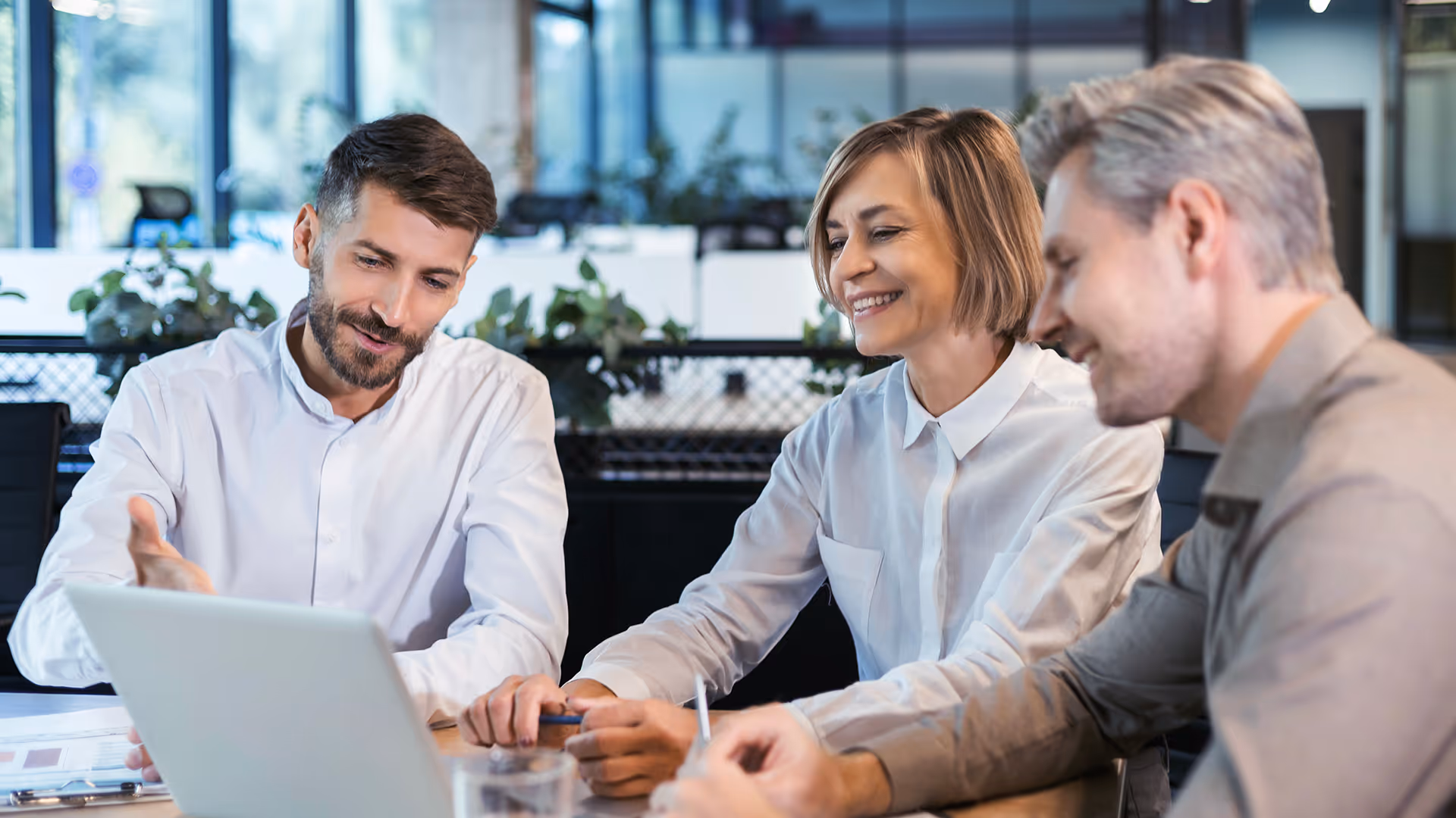 Specialist advisor discussing tour operator insurance with client