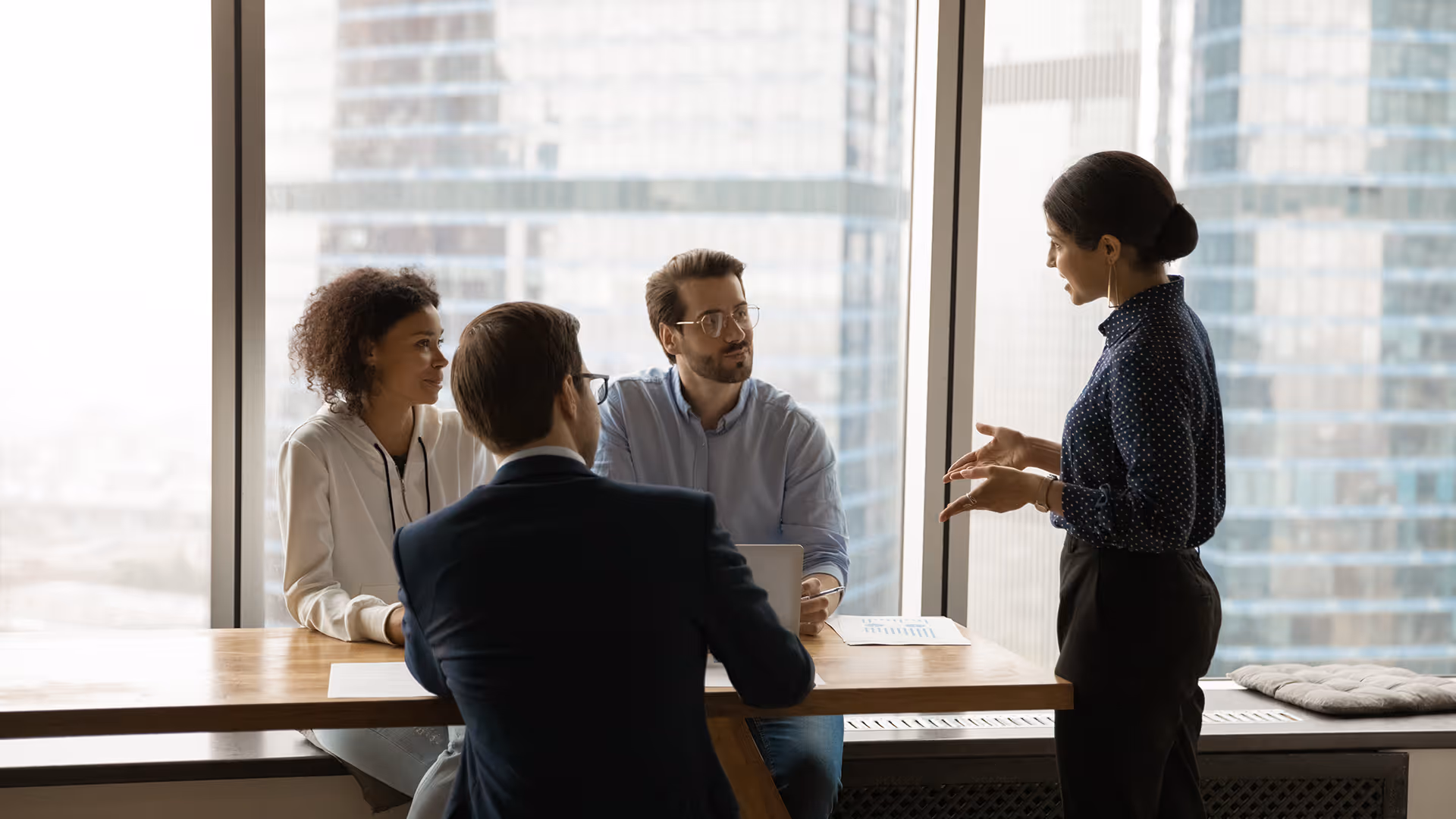 Team discussing tour operator liability insurance