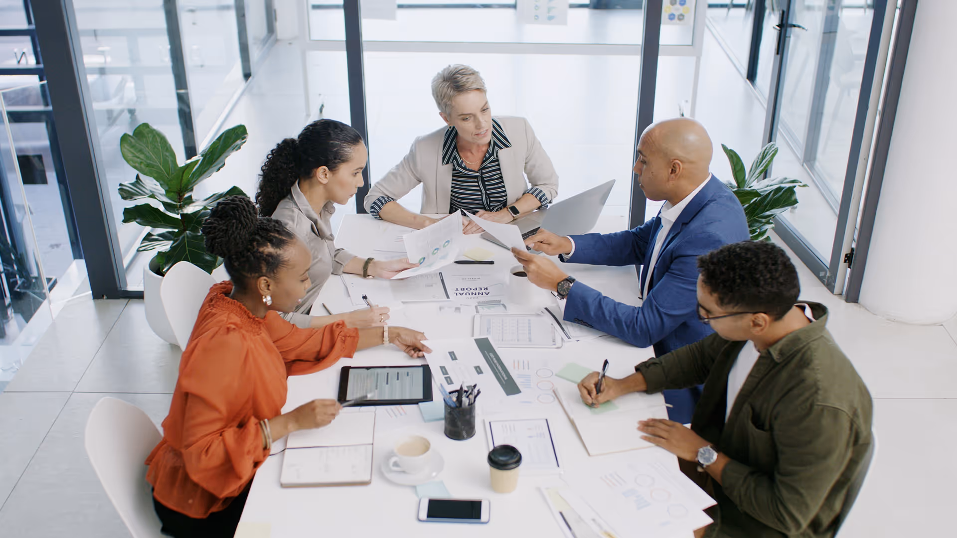 Team assessing travel business insurance solutions
