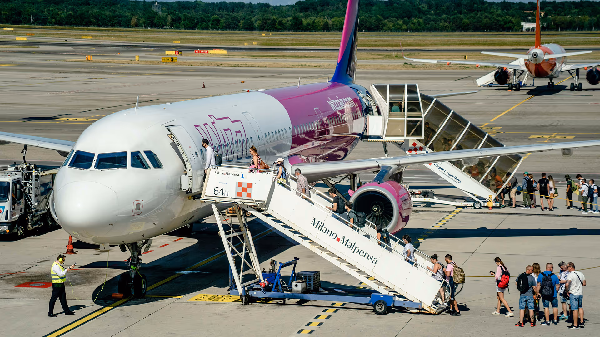 Passengers boarding a plane to be repatriated