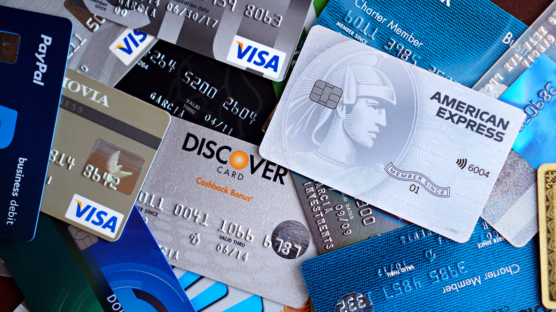 Pile of credit cards, representing card scheme exposure