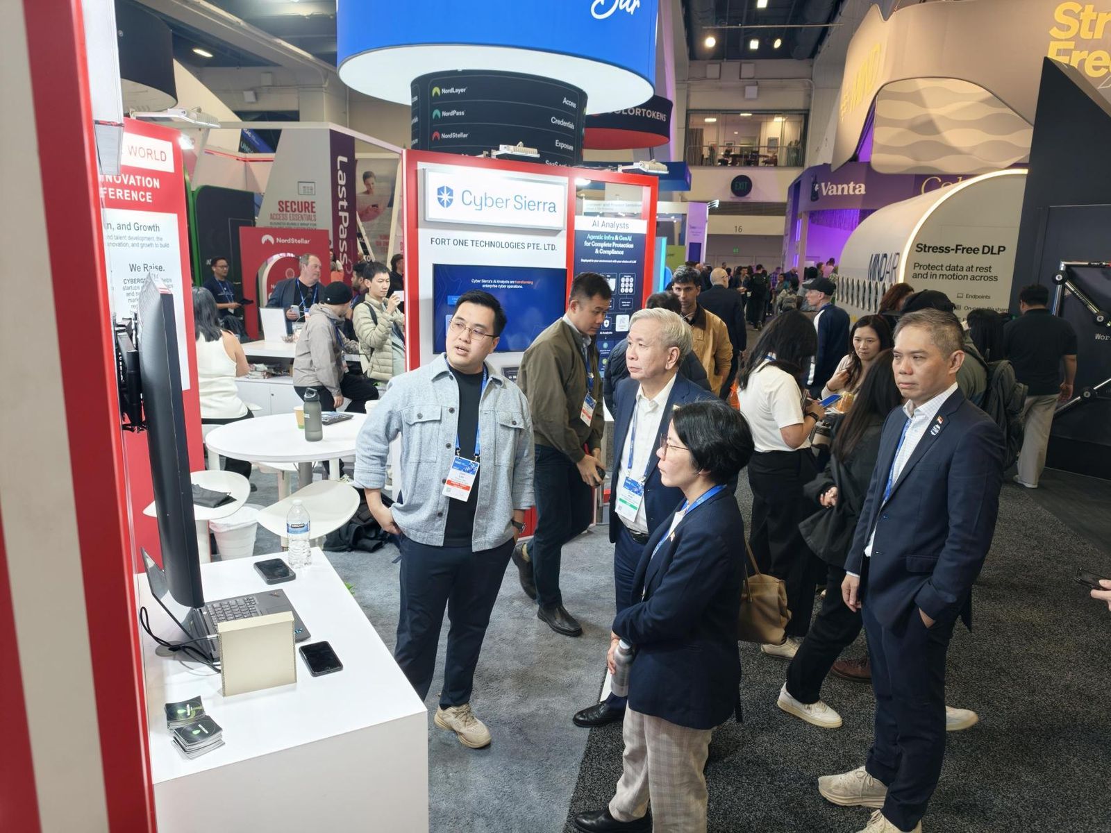 Joel Lee, Co-founder & CEO of Protos Labs, explaining Protos AI to visitors at the booth