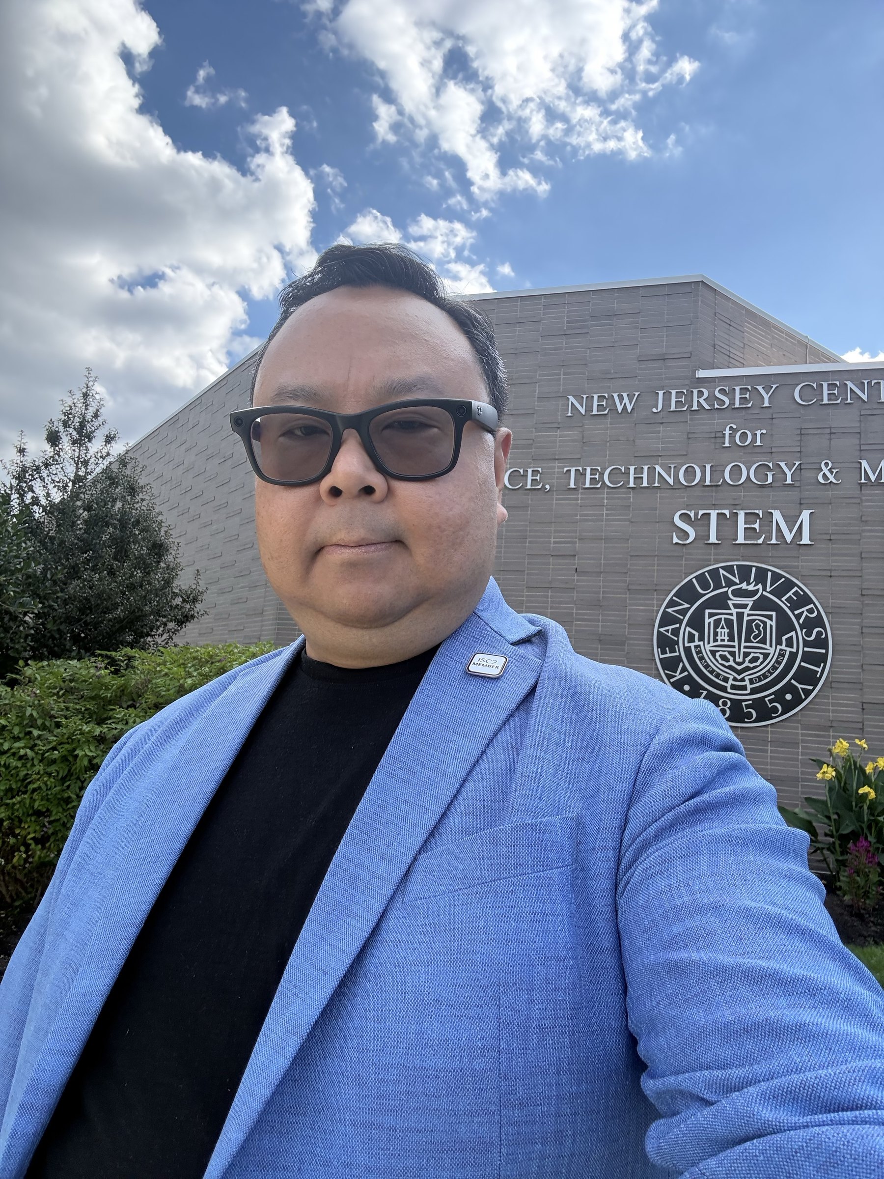 Sam Goh outside the New Jersey Center for Science, Technology and Mathematics