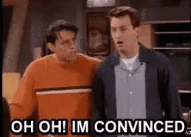 Joey staring while Chandler panicking and saying 'Oh Oh! I'm convinced.'