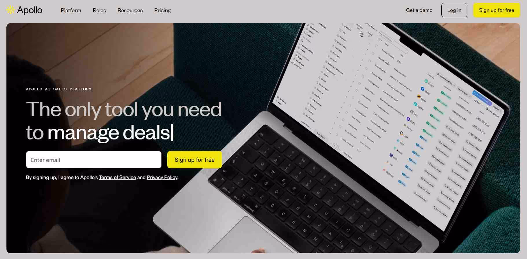 Laptop displaying Apollo.io sales platform.