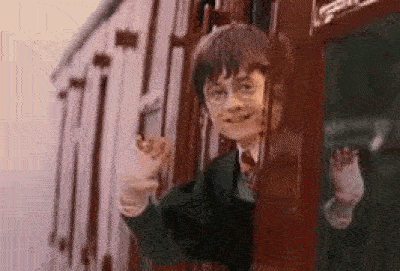 Harry Potter waving goodbye from the train
