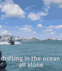 boat drifting in the ocean all alone