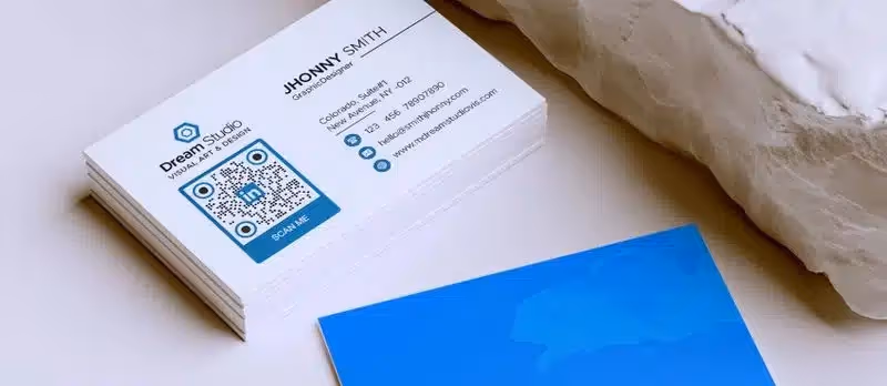 LinkedIn QR code on a business card.