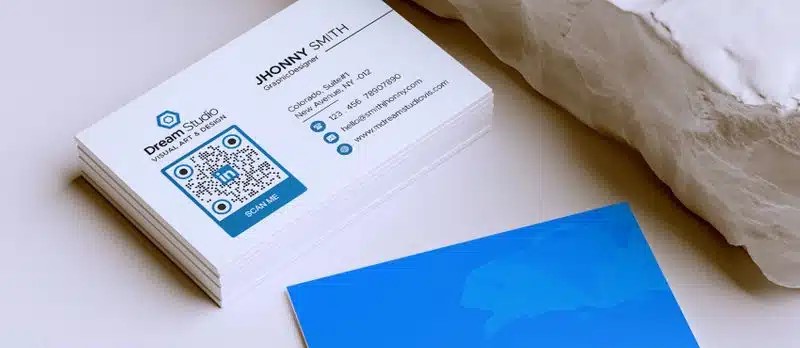 LinkedIn QR code on a business card.