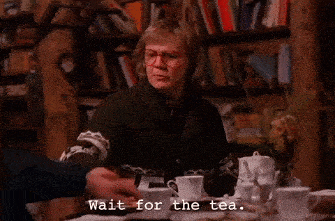 Log Lady from Twin Peaks slapping a hand and saying to wait for tea