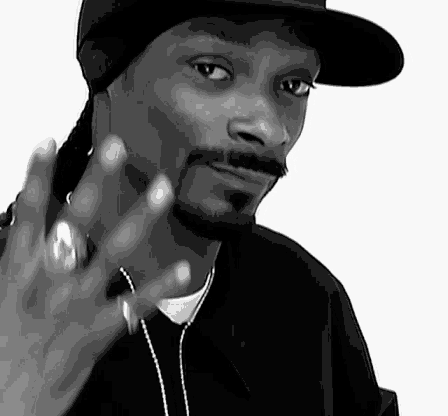 Snoop Dogg showing the number four