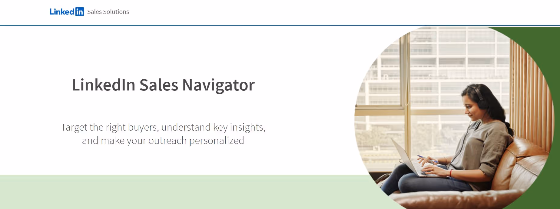 LinkedIn Sales Navigator advertisement featuring a woman working on a laptop