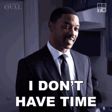 A humorous gif of a man saying he doesn't have time.