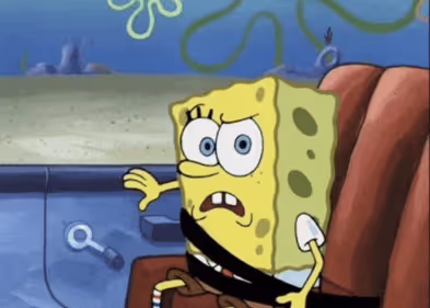 Spongebob sitting shocked looking surprised