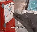 A dolphin holding a paintbrush in its mouth, painting on an easel, with the text "I AM ARTISTE".