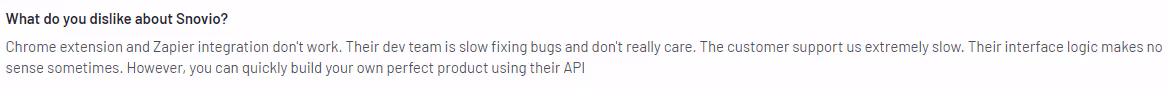 A customer review stating "What do you dislike about Snovio?" criticizing the Chrome extension, Zapier integration, slow development, and poor customer support.