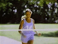 Gif of a girl finishing marathon.