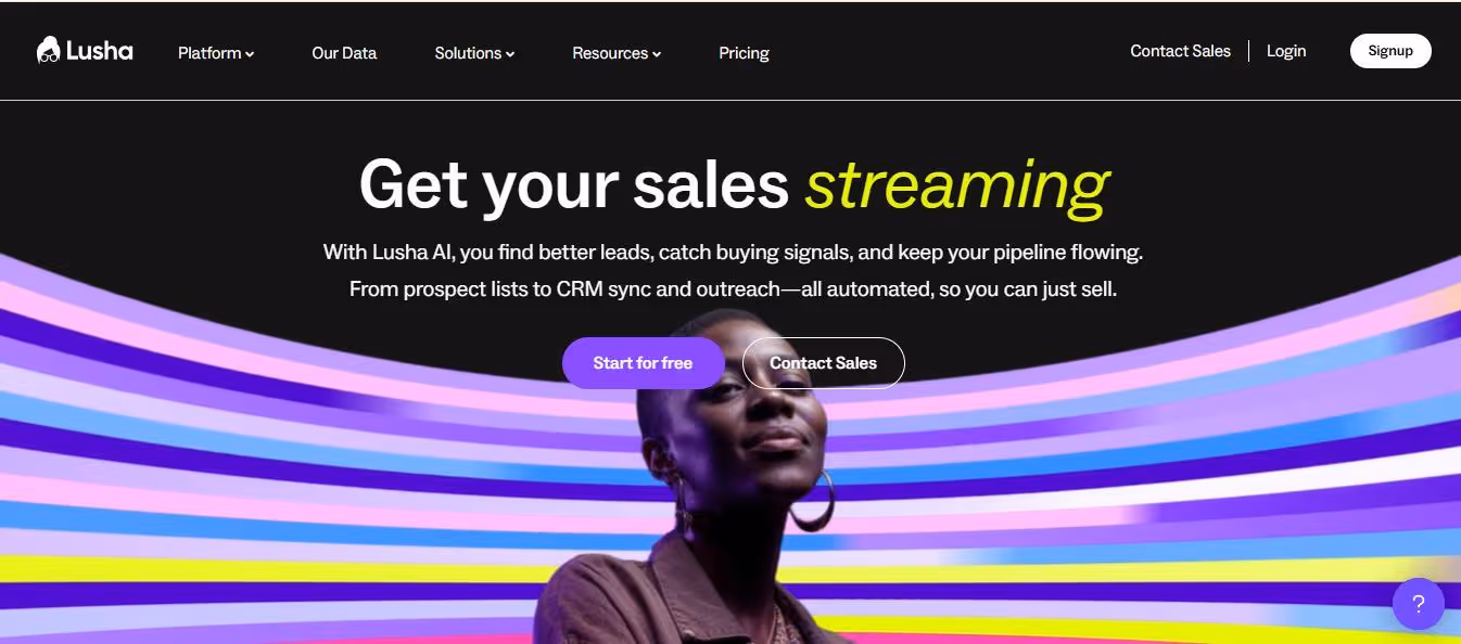 A website homepage for Lusha, a sales streaming platform, with a woman looking up against a colorful background.