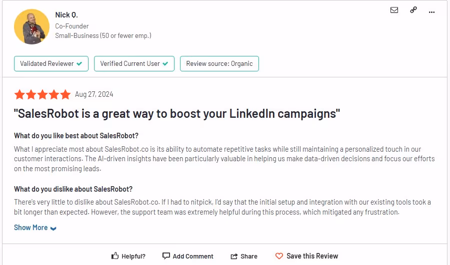 A customer review for 'SalesRobot' from Nick Q., highlighting positive and negative aspects of the service.