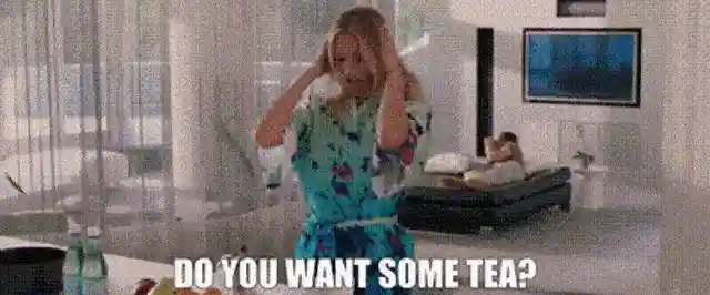 Woman asking her partner "Do you want some tea?"