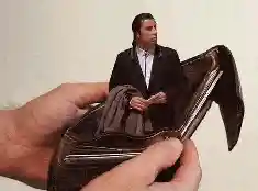 John Travolta with an empty wallet.