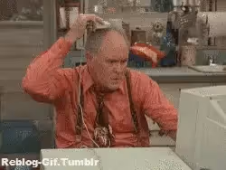 Man scratching his head