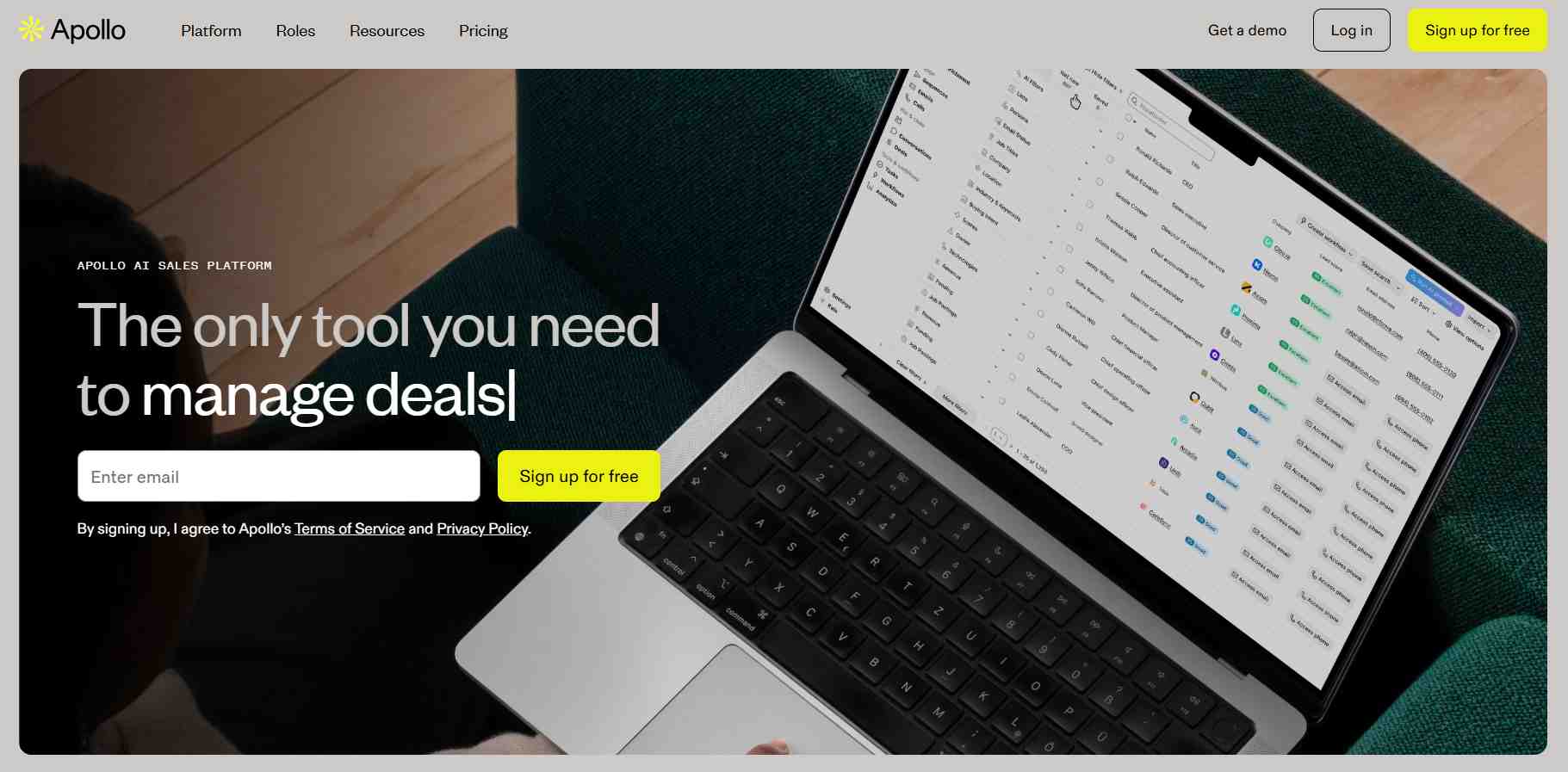 Laptop displaying Apollo.io sales platform.