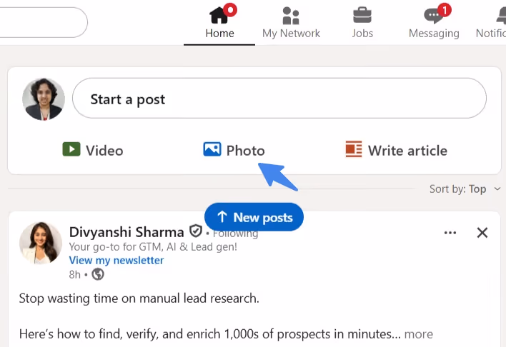LinkedIn post creation box with an arrow highlighting the Media (Photo) button to click.