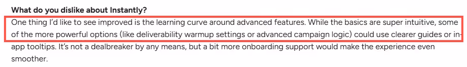A customer review for Instantly.ai suggesting improvements to the learning curve for advanced features like deliverability warm-up settings and advanced campaign logic.