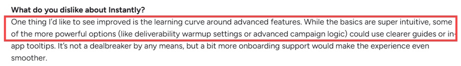 A customer review for Instantly.ai suggesting improvements to the learning curve for advanced features like deliverability warm-up settings and advanced campaign logic.