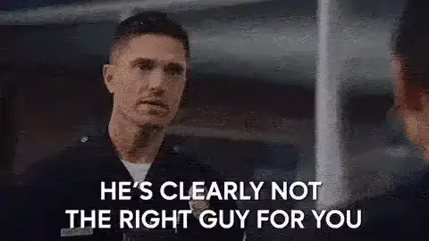 A man in a police uniform speaking to another person, with text overlay "HE'S CLEARLY NOT THE RIGHT GUY FOR YOU"