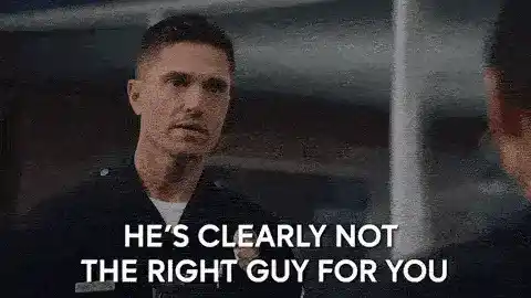A man in a police uniform speaking to another person, with text overlay "HE'S CLEARLY NOT THE RIGHT GUY FOR YOU"