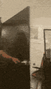A person opens a door.