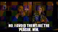 A pixelated GIF of a person speaking, with the text 
