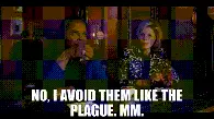 A pixelated GIF of a person speaking, with the text