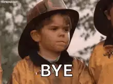 A young child dressed as a firefighter looks upset with the word "BYE" superimposed over the image.