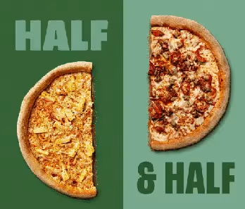 A pizza cut in half with two different toppings.