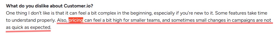 Screenshot of a review mentioning that Customer.io can be complex initially and pricing can be high for smaller teams.