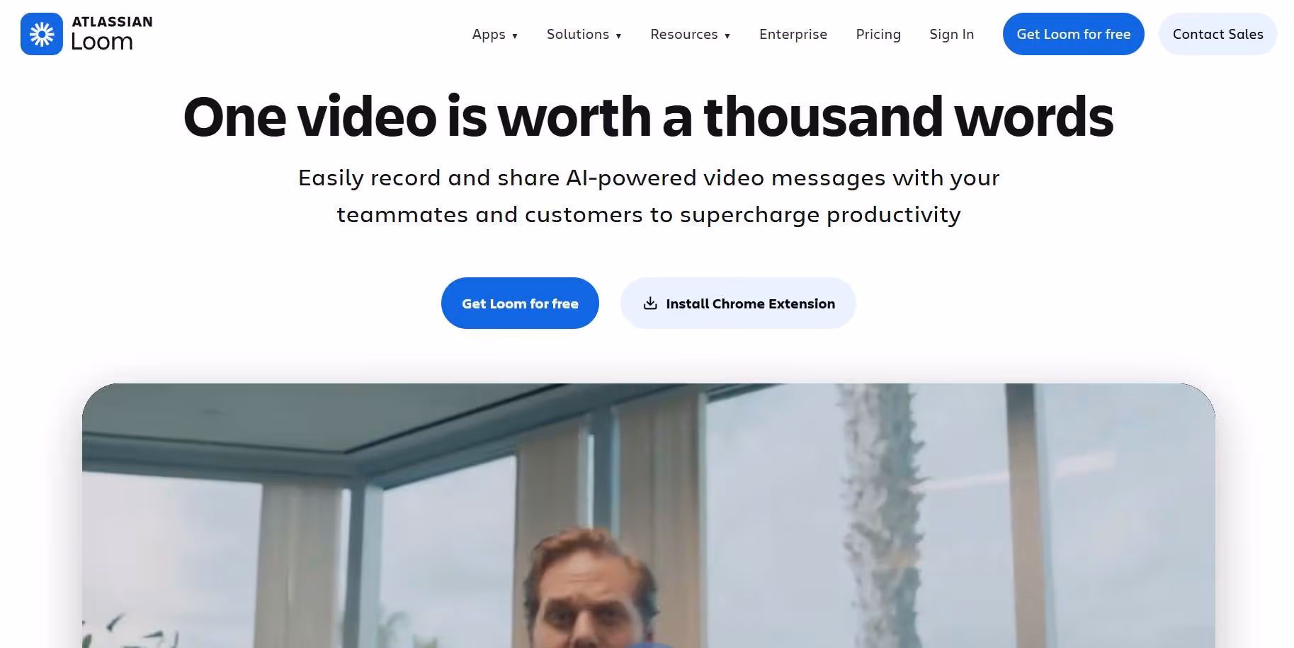 Screenshot of the Atlassian Loom homepage, featuring the headline "One video is worth a thousand words" and call-to-action buttons.